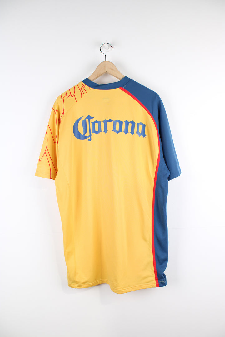 Vintage Club America 2007/08, Nike home football shirt, yellow, red and blue team colourway, v neck, and has logos printed on the front and back.