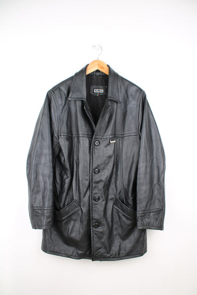 Vintage 90's Kickers black leather 3/4 length coat, features pockets and metal branded tab on the chest