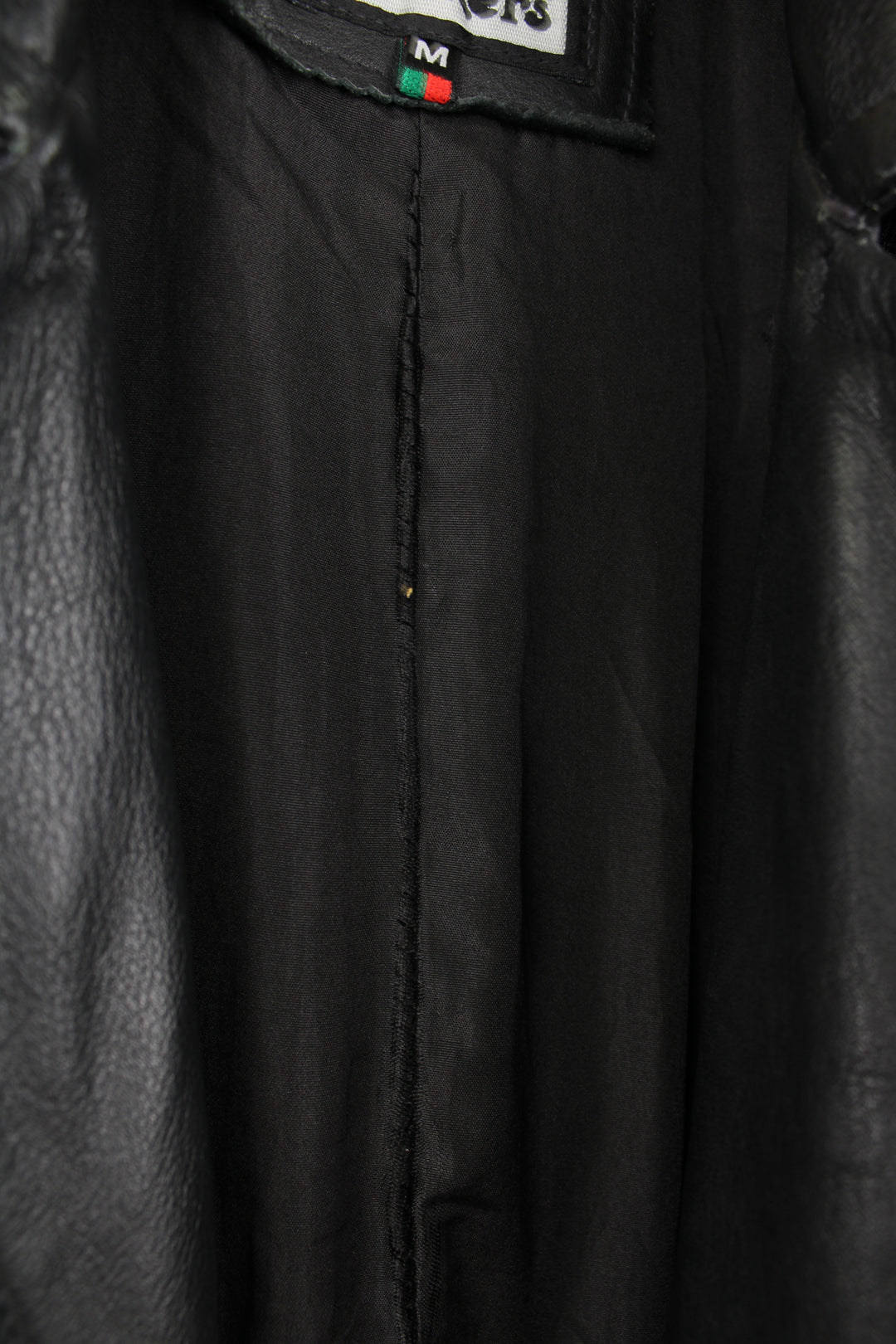 Vintage 90's Kickers black leather 3/4 length coat, features pockets and metal branded tab on the chest