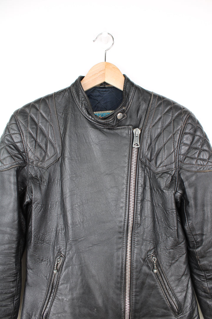 Vintage 1970's rare, black leather zip through cafe racer style biker jacket by Speedman Leathers  