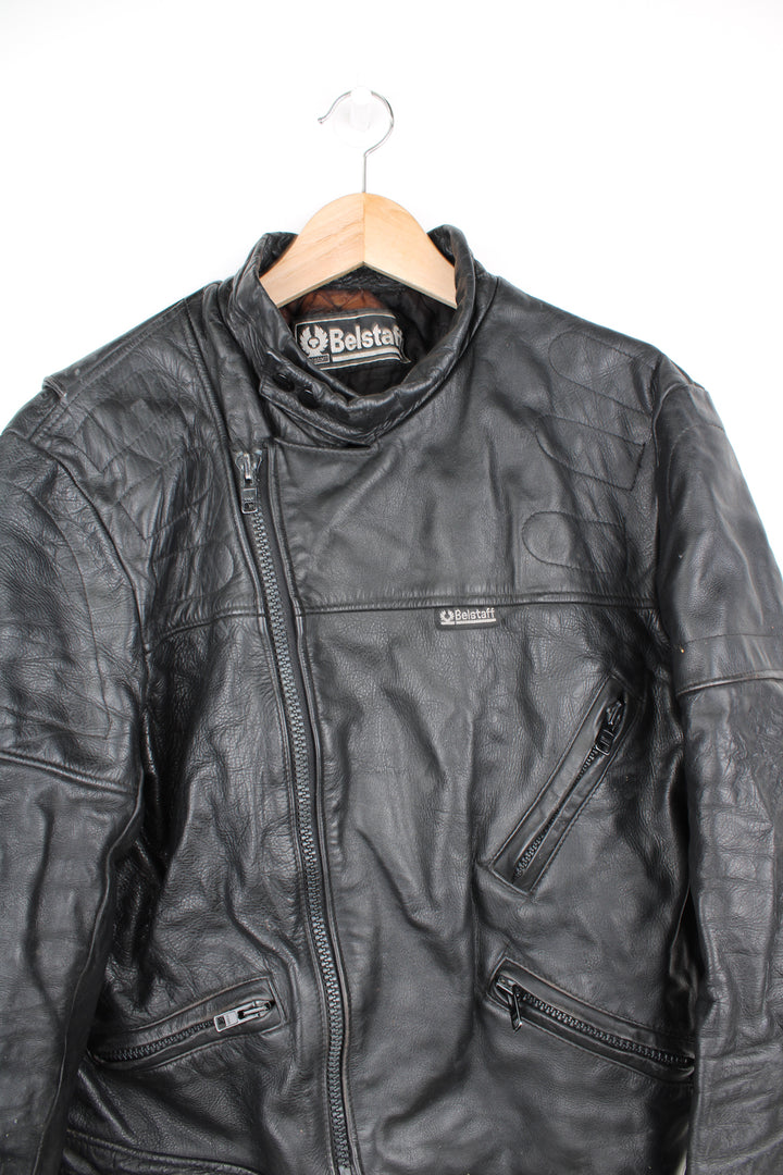 Vintage Belstaff Cafe Racer style black leather biker jacket, with multiple pockets and adjustable waistband buckles 