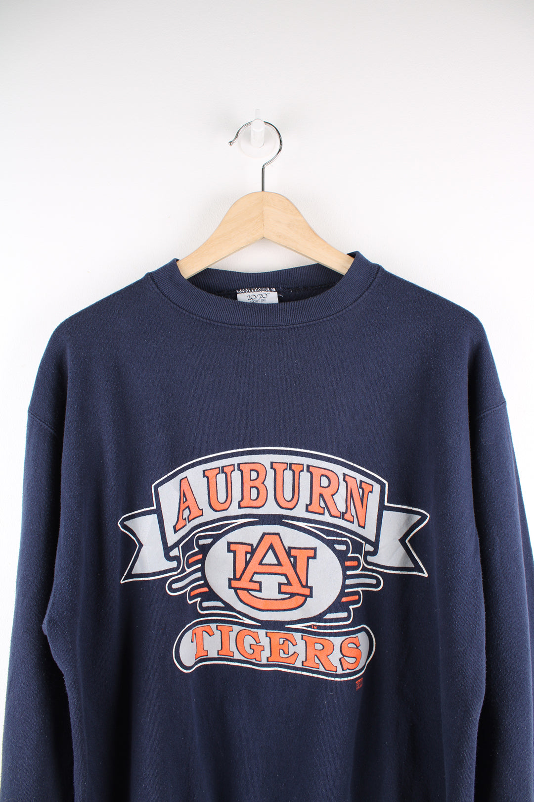 Vintage made in the USA navy blue Auburn Tigers crewneck sweatshirt, features printed spell-out graphic on the front 