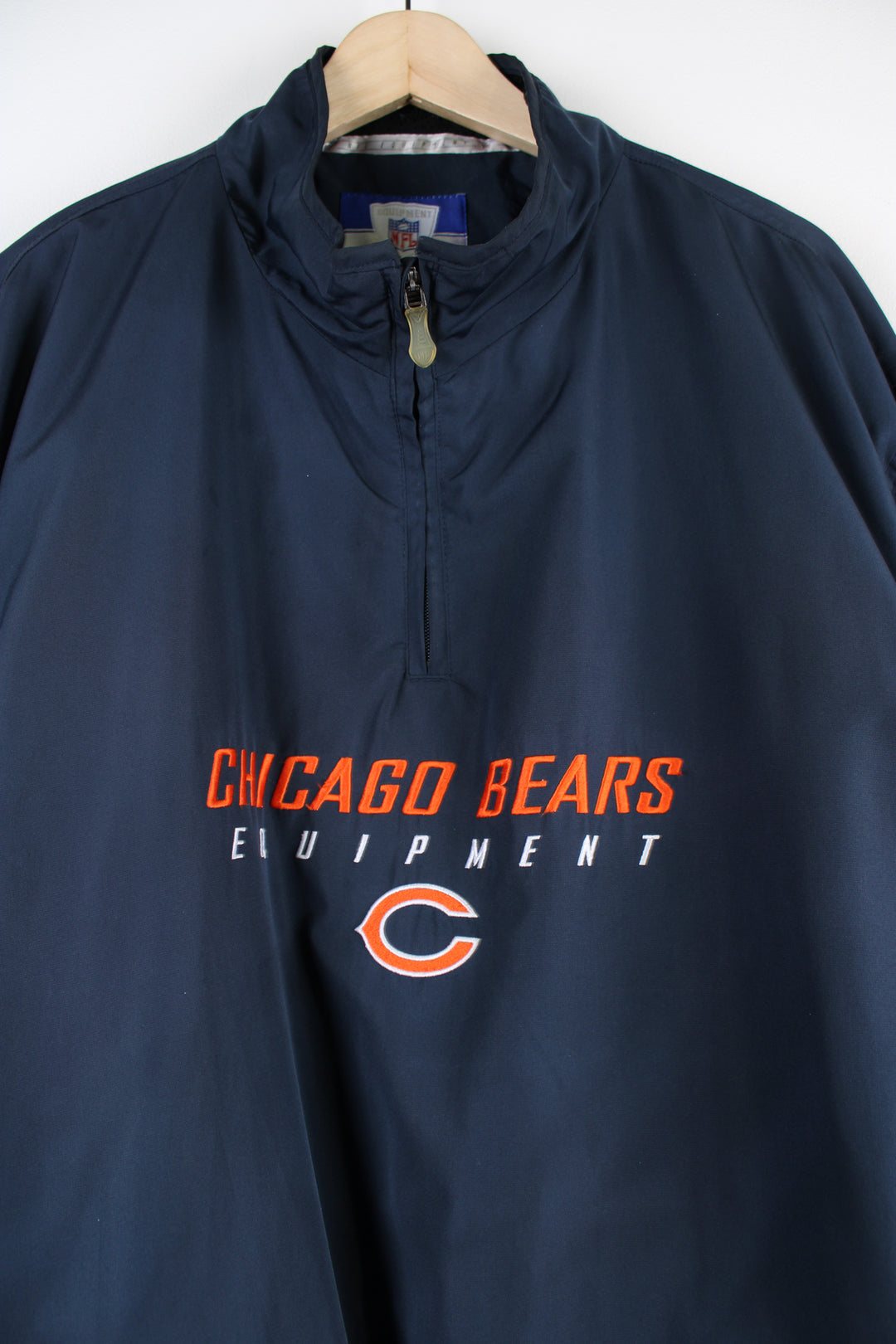 Vintage 00's Reebok Chicago Bears pull over /training top with quarter zip neckline and embroidered team logo on the across the chest. Also features zips down the sides of the torso. good condition - some faint marks on the back (see photos) Size in Label: L