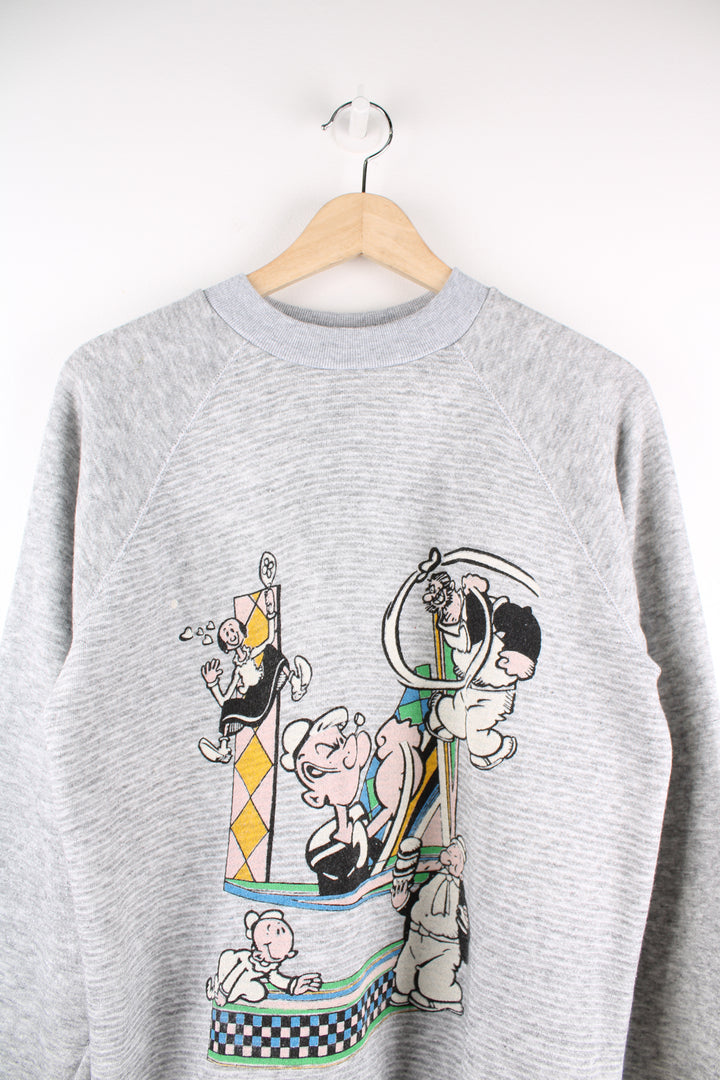 Vintage Popeye grey crewneck sweatshirt, features printed Popeye and friends graphic on the front, unbranded no labels. 