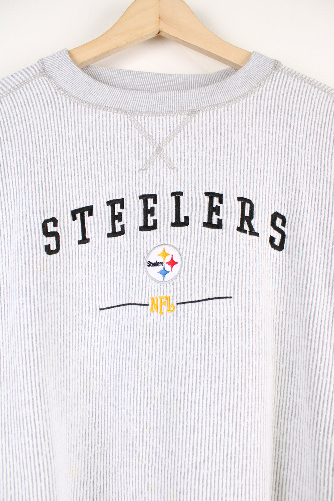 Vintage Pittsburgh Steelers grey ribbed sweatshirt with embroidered team logo on the chest. Sweatshirt made by NFL. good condition  Size in Label:   No Size Label - Measures like a mens XXL