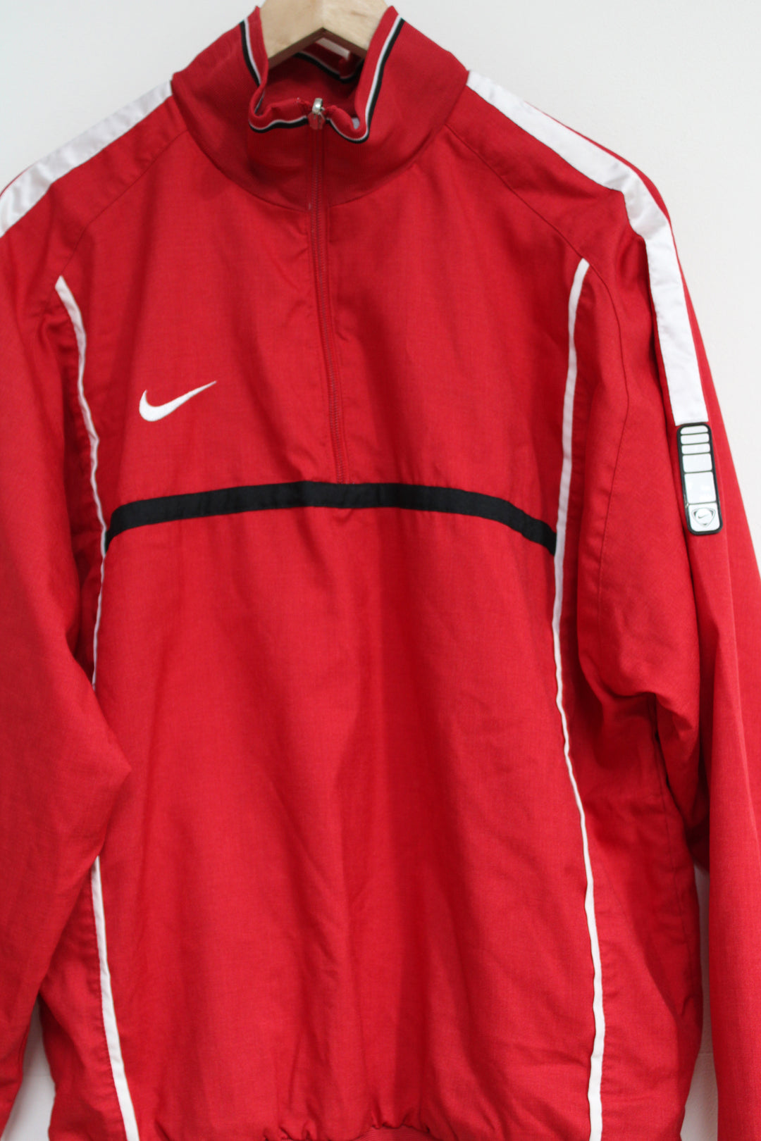 2000's Nike red pullover tracksuit top with 1/4 zip and embroidered swoosh logo on the chest