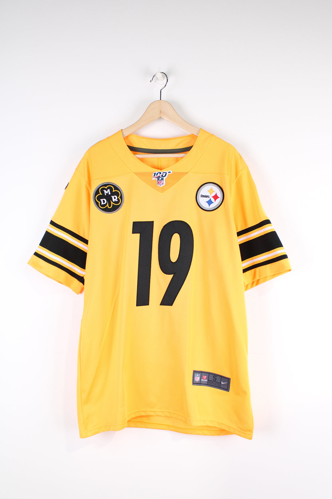 Pittsburgh Steelers, Nike NFL Jersey, yellow and black colourway, Inverted Legends series with Smith - Schuster number 19 embroidered on the back, as well as logos on the front. 