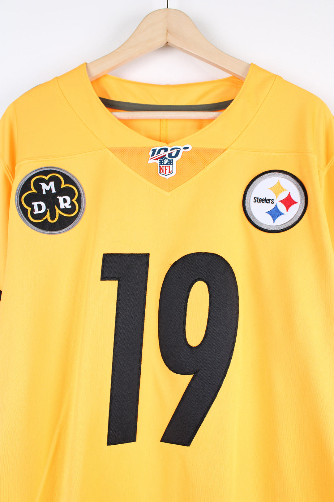 Pittsburgh Steelers, Nike NFL Jersey, yellow and black colourway, Inverted Legends series with Smith - Schuster number 19 embroidered on the back, as well as logos on the front. 