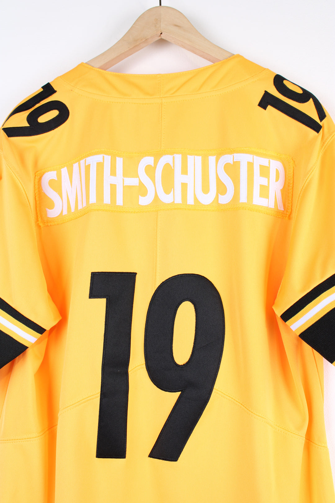 Pittsburgh Steelers, Nike NFL Jersey, yellow and black colourway, Inverted Legends series with Smith - Schuster number 19 embroidered on the back, as well as logos on the front. 