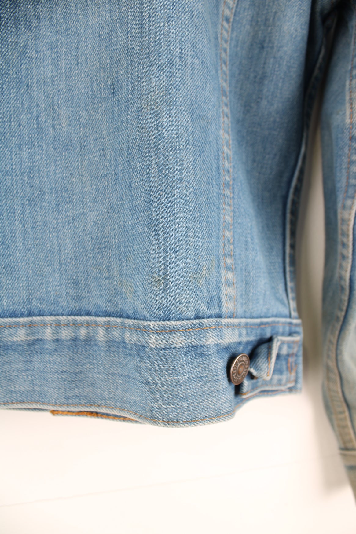 Vintage 1970s Levi Strauss orange tab light wash cropped denim trucker jacket with pockets 