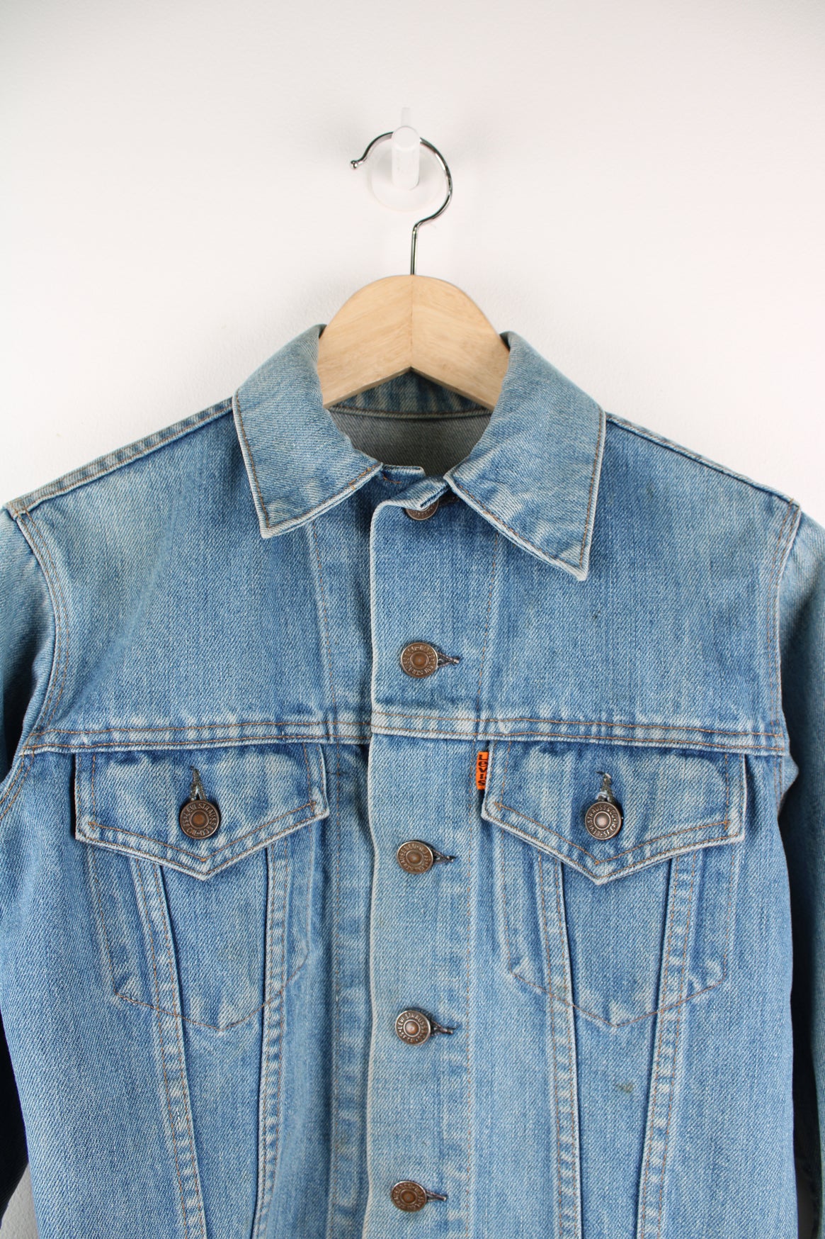 Vintage 1970s Levi Strauss orange tab light wash cropped denim trucker jacket with pockets 