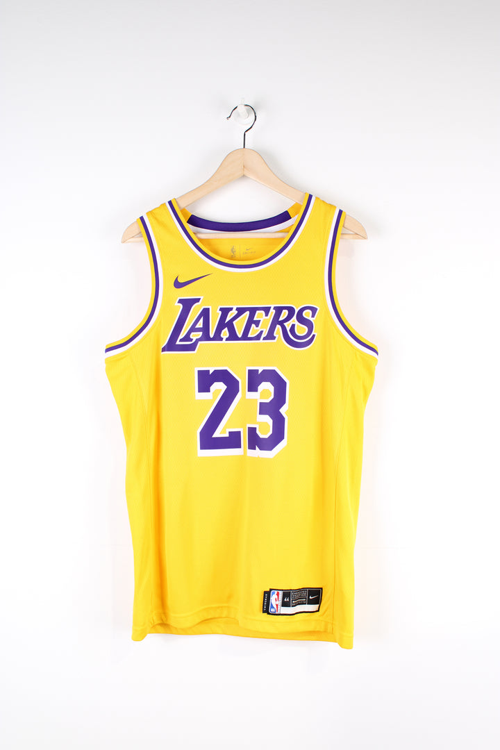 Los Angeles Lakers number 23 LeBron James NBA Jersey made by Swingman.  good condition  Size in Label:  Mens M 44