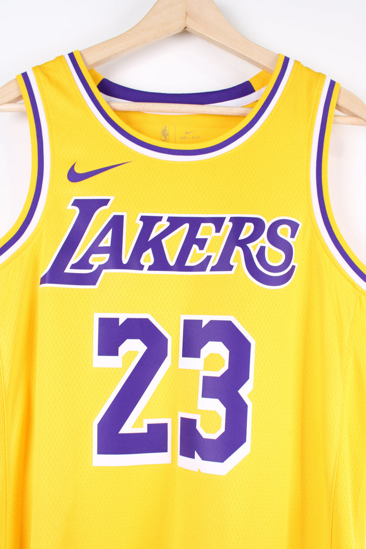 Los Angeles Lakers number 23 LeBron James NBA Jersey made by Swingman.  good condition  Size in Label:  Mens M 44