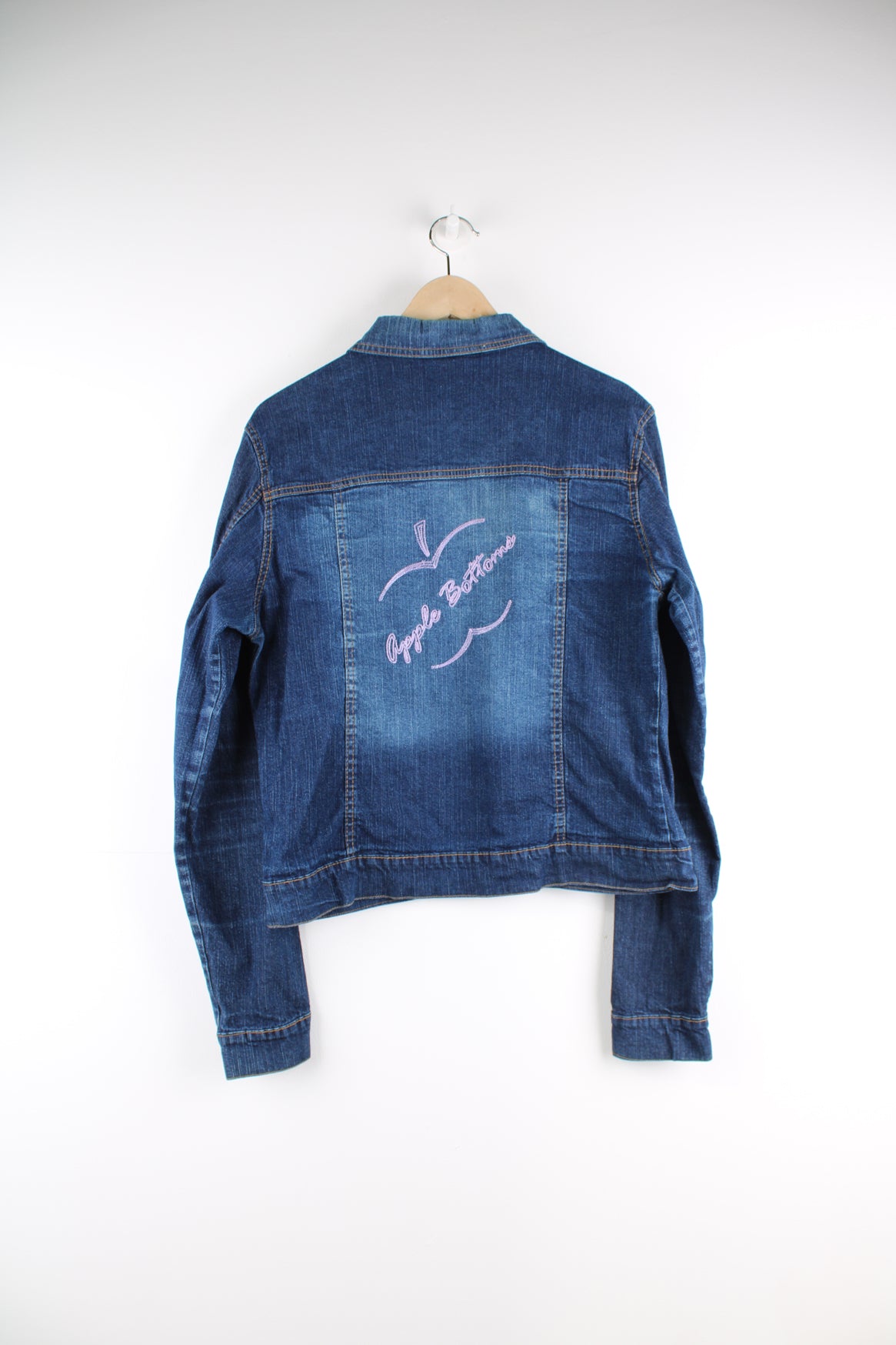 Y2K Apple Bottoms zip through denim jacket, features graffiti like embroidery on the shoulders 