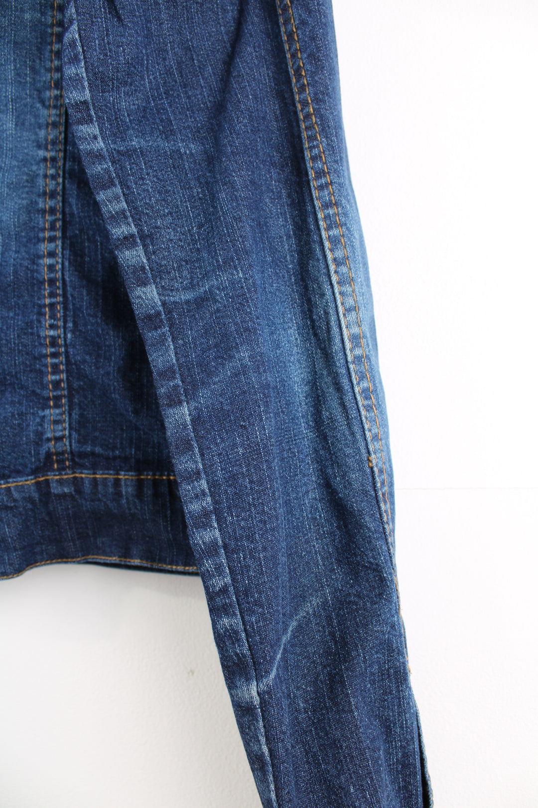 Y2K Apple Bottoms zip through denim jacket, features graffiti like embroidery on the shoulders 