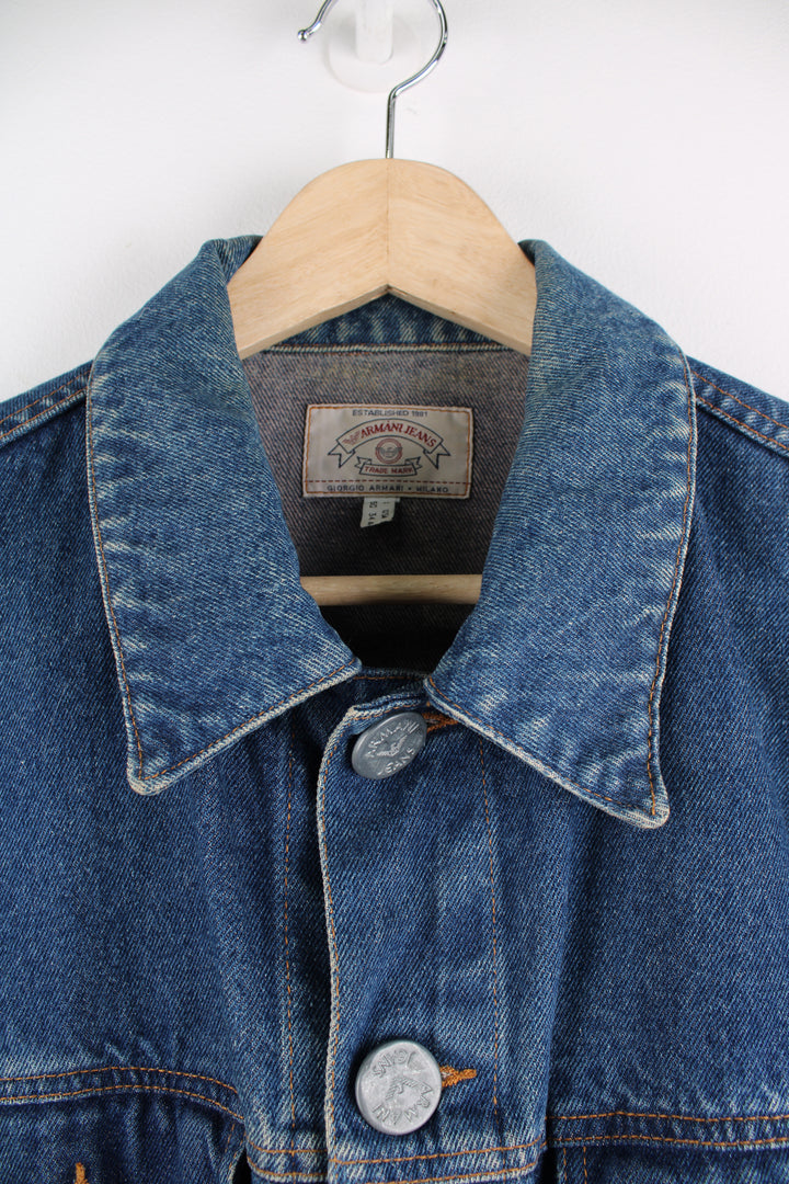 Vintage Armani Jeans  button up denim jacket features branded hardware and double pockets 