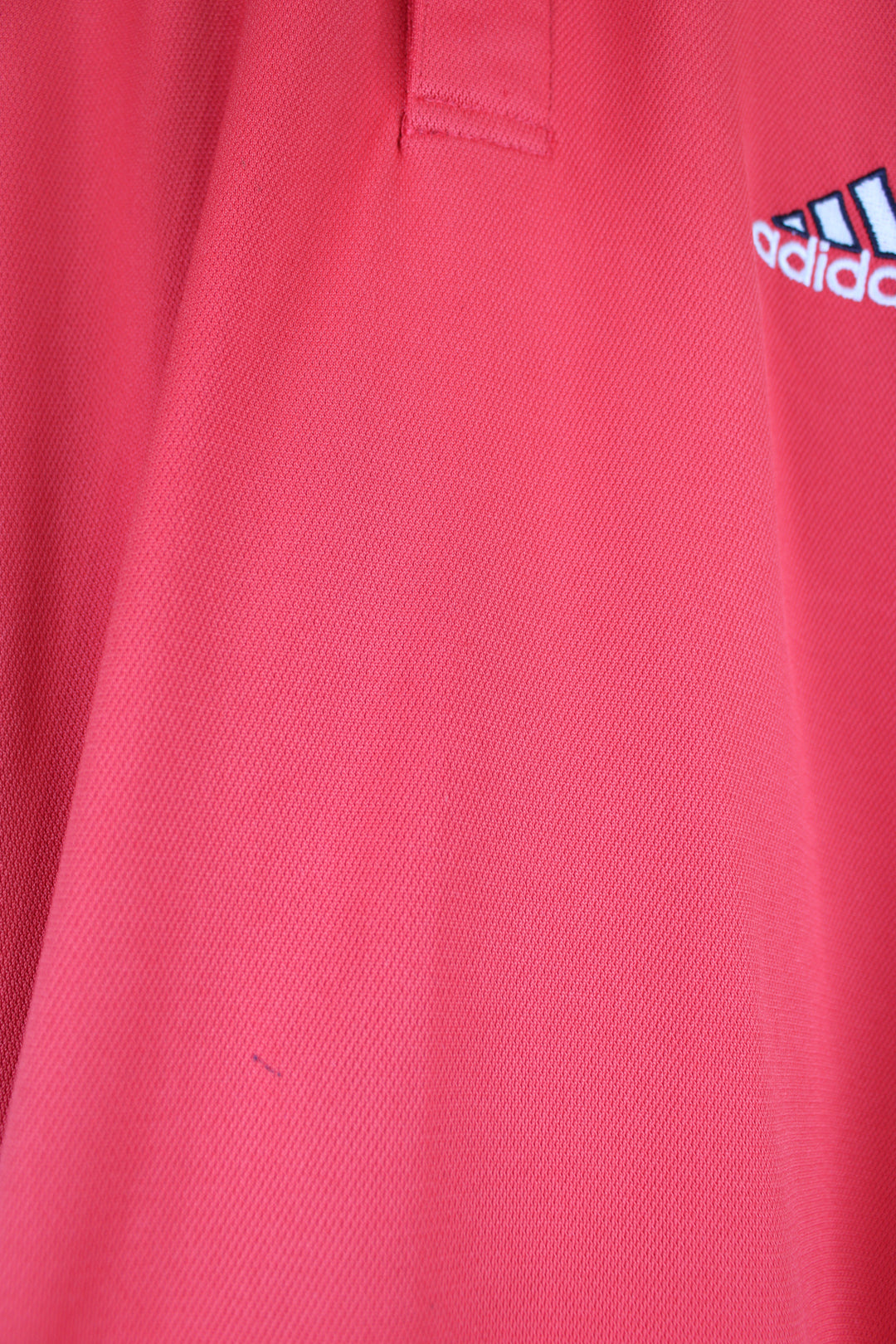 Vintage Adidas Polo Shirt in a red and navy colourway, has the iconic 3 white stripes going down the sleeves, button up with embroidered logo on the chest. 