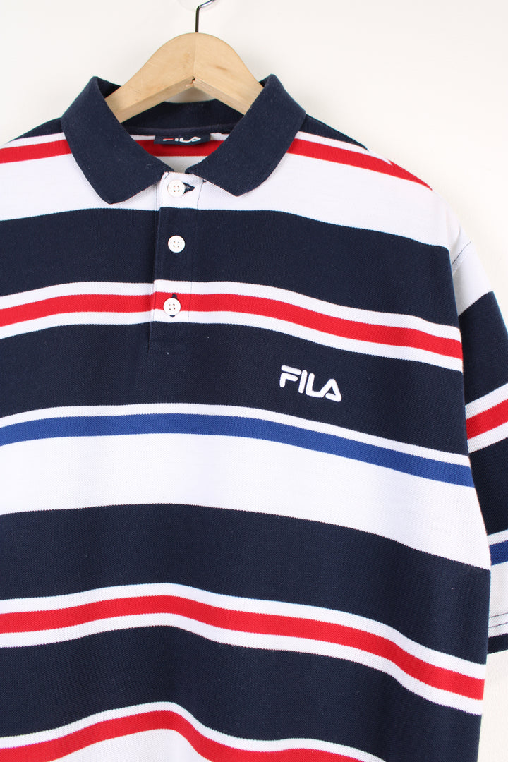 Vintage Fila Polo Shirt, blue, red and white striped colourway, button up, short sleeves, and has logo embroidered on the chest. 