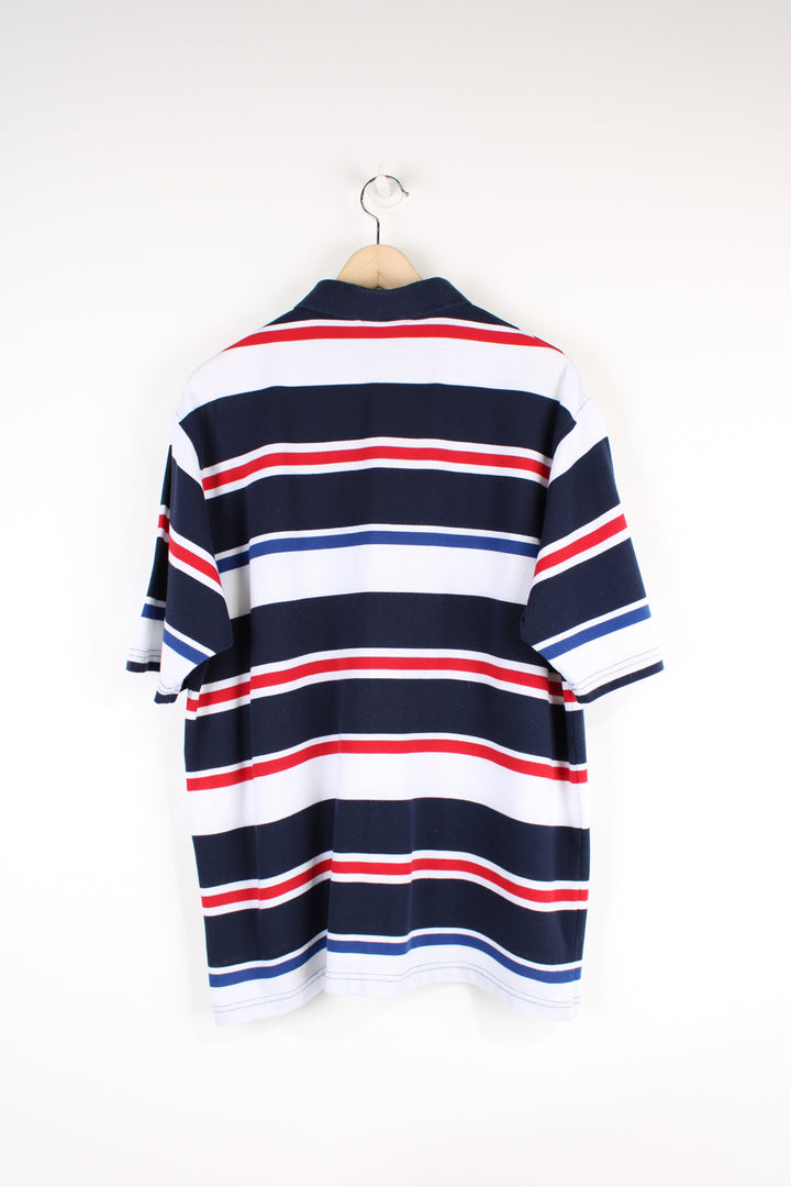 Vintage Fila Polo Shirt, blue, red and white striped colourway, button up, short sleeves, and has logo embroidered on the chest. 