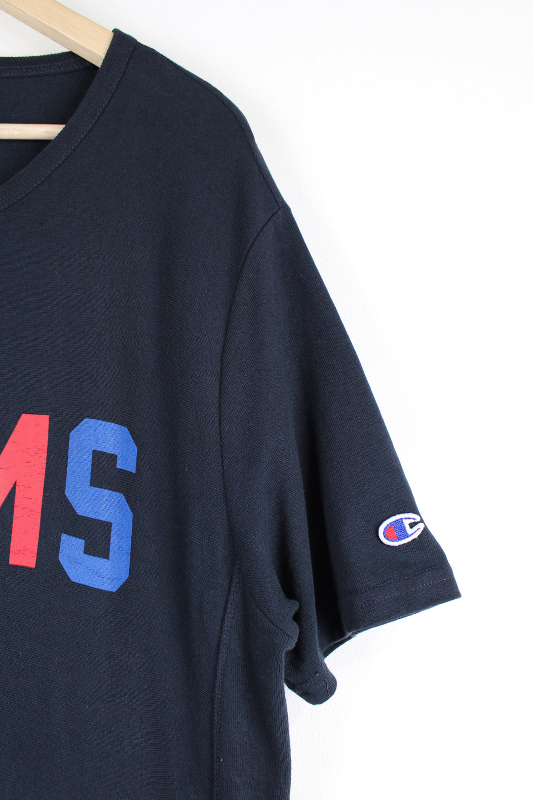 Beams x Champion T-shirt, blue, red and white colourway, short sleeves, big neck lining, has a big front pocket, as well as big spell-out logo across the chest. 