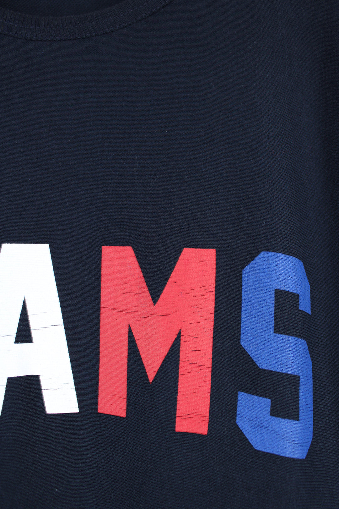 Beams x Champion T-shirt, blue, red and white colourway, short sleeves, big neck lining, has a big front pocket, as well as big spell-out logo across the chest. 