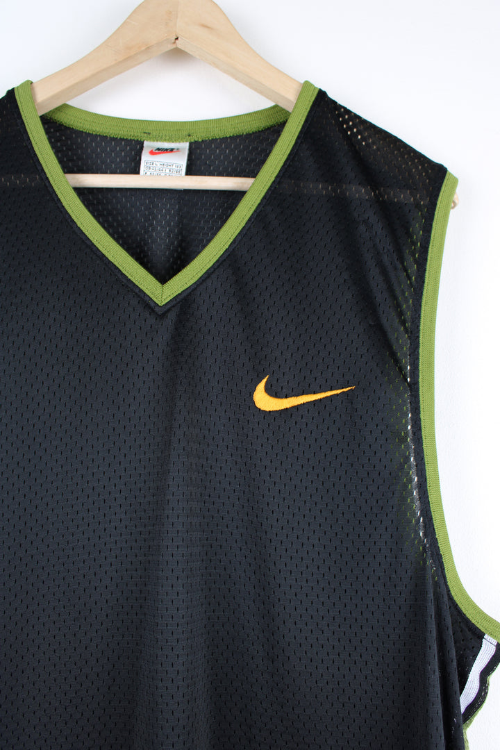 Vintage 90's Nike Mesh Vest Top, black and green colourway with orange embroidered swoosh logo, v neck, and is 100% nylon.