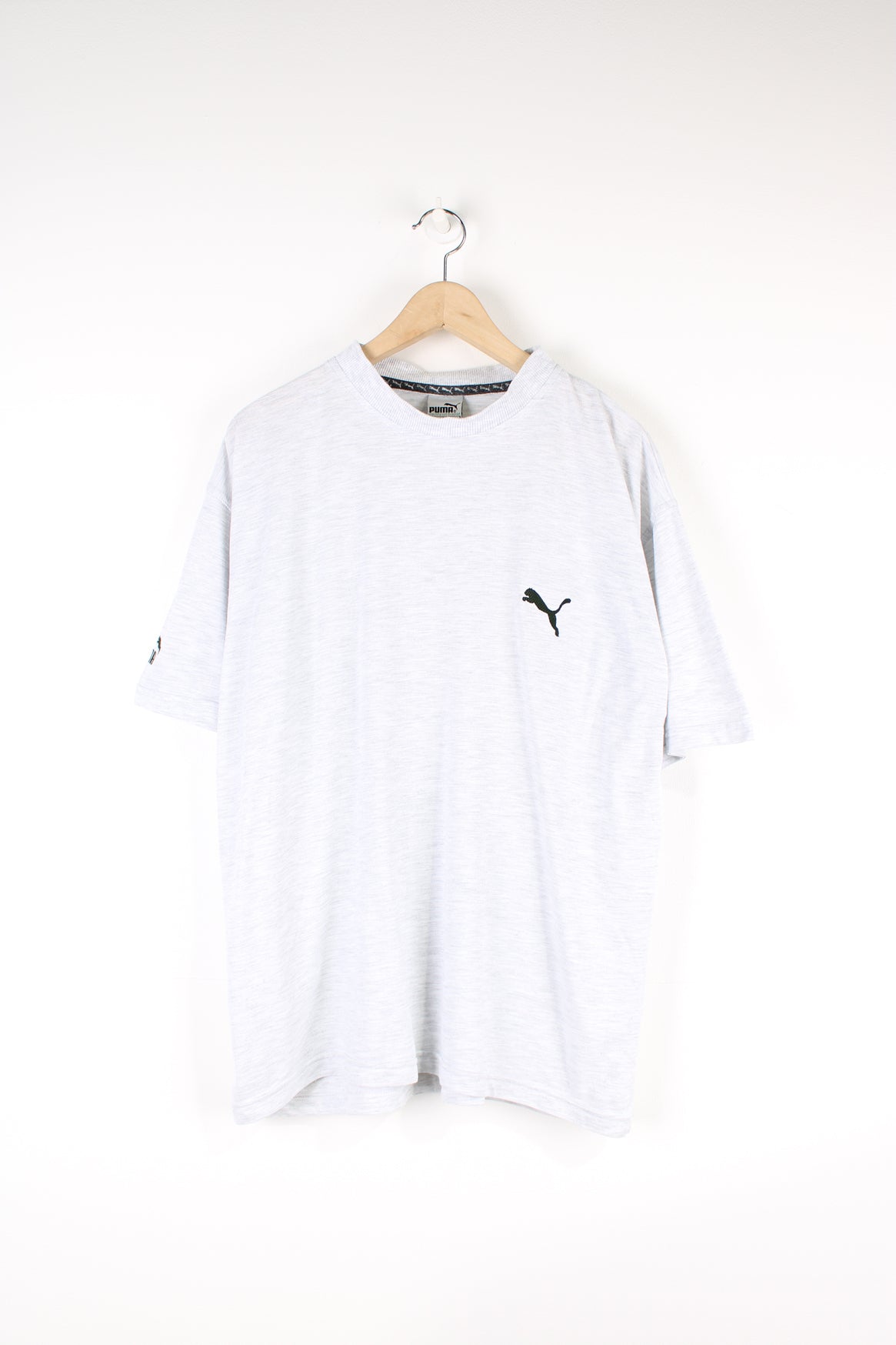 Vintage Puma T-shirt, plain grey colourway with black embroidered logos on the chest and sleeve. 