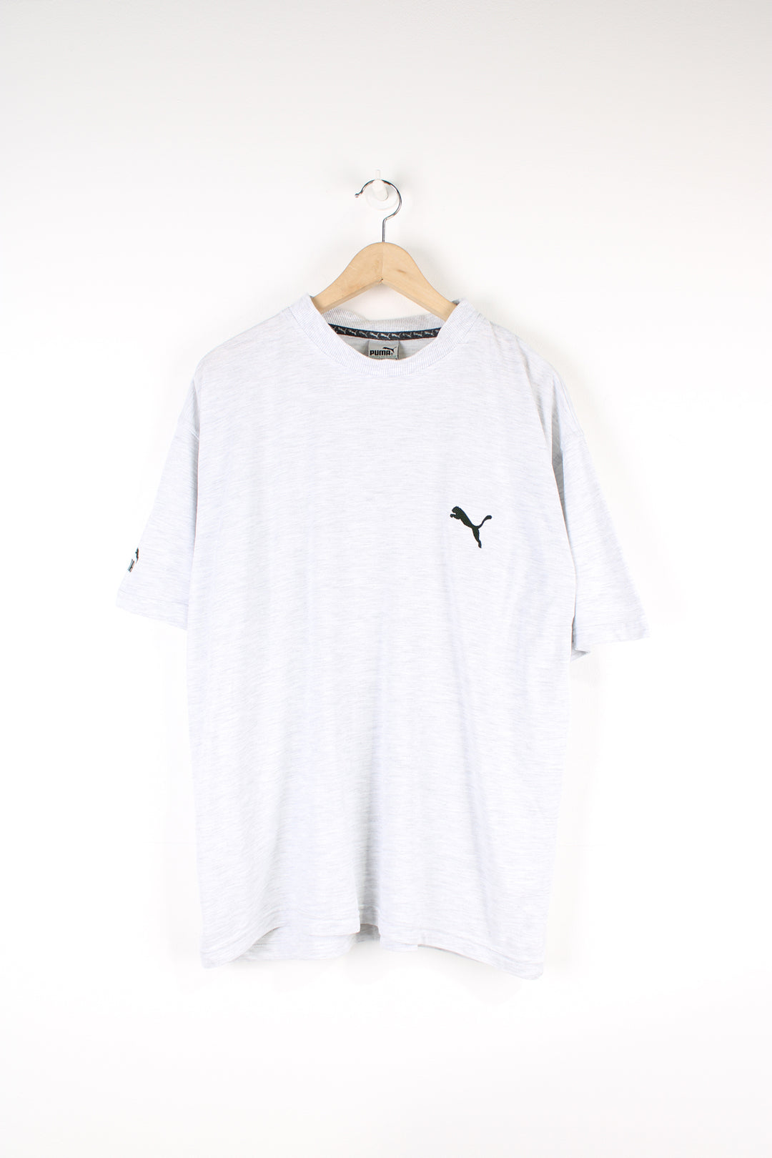 Vintage Puma T-shirt, plain grey colourway with black embroidered logos on the chest and sleeve. 