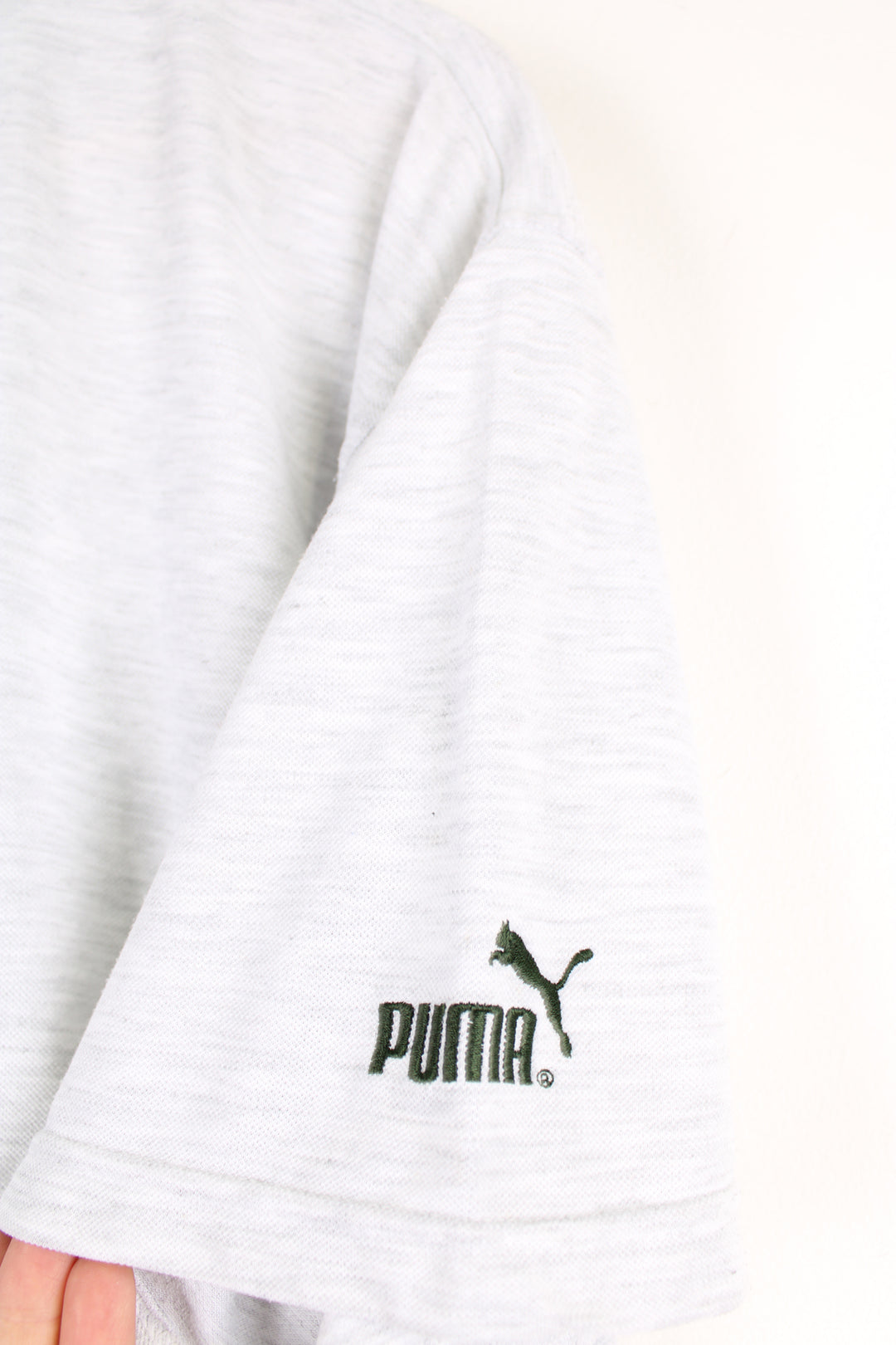 Vintage Puma T-shirt, plain grey colourway with black embroidered logos on the chest and sleeve. 