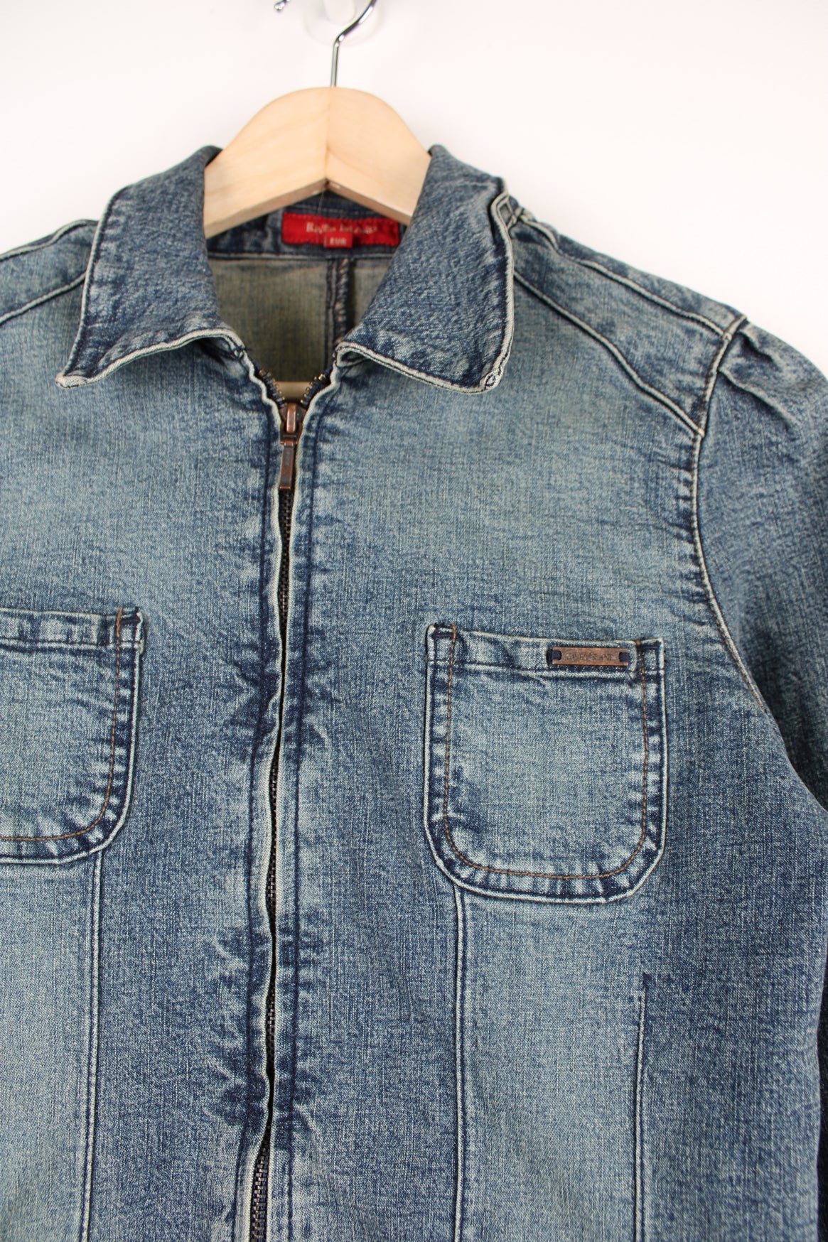 Vintage Y2K denim shirt/ jacket. Made from stretch denim and closes with a zip.   good condition  Size in label:   10 - Measures like a womens M