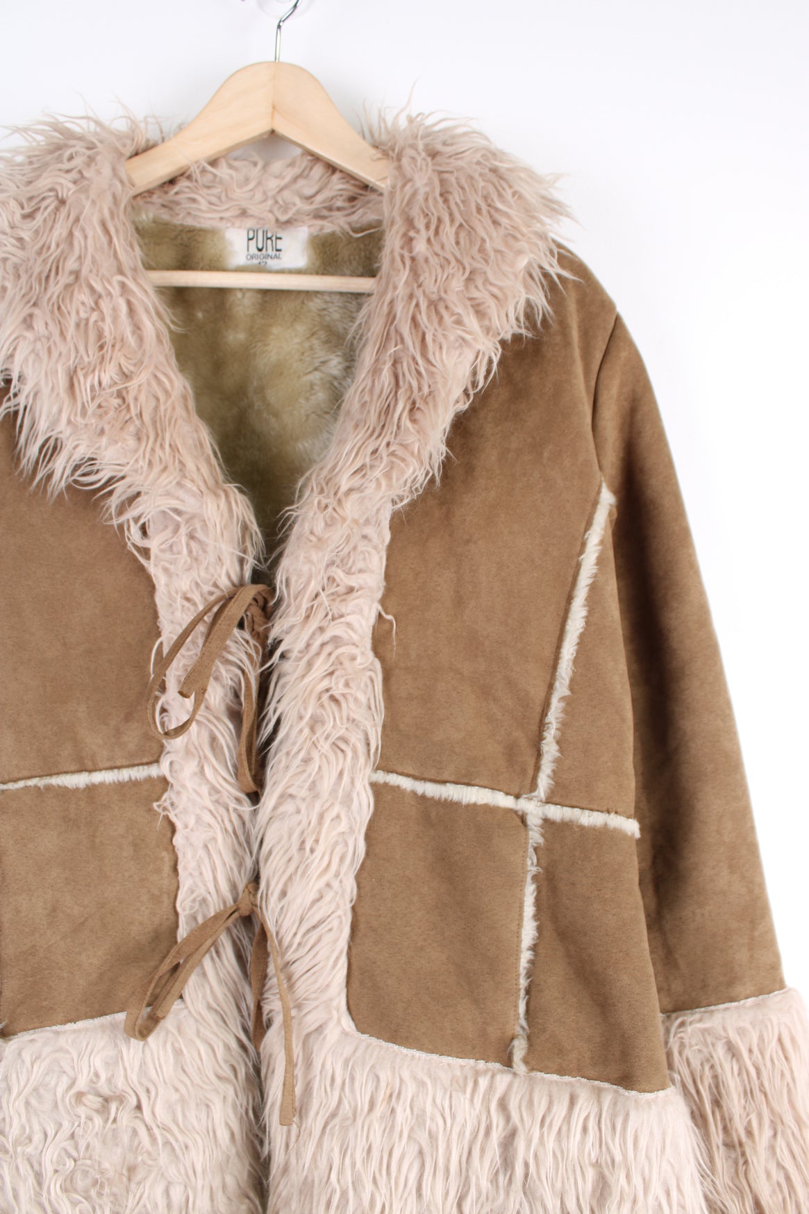 Vintage Y2K brown afghan coat made from faux sheepskin with cream faux fur trim. Closes with two ties at the front. good condition Size on Label: 12 - Measures like a Womens L