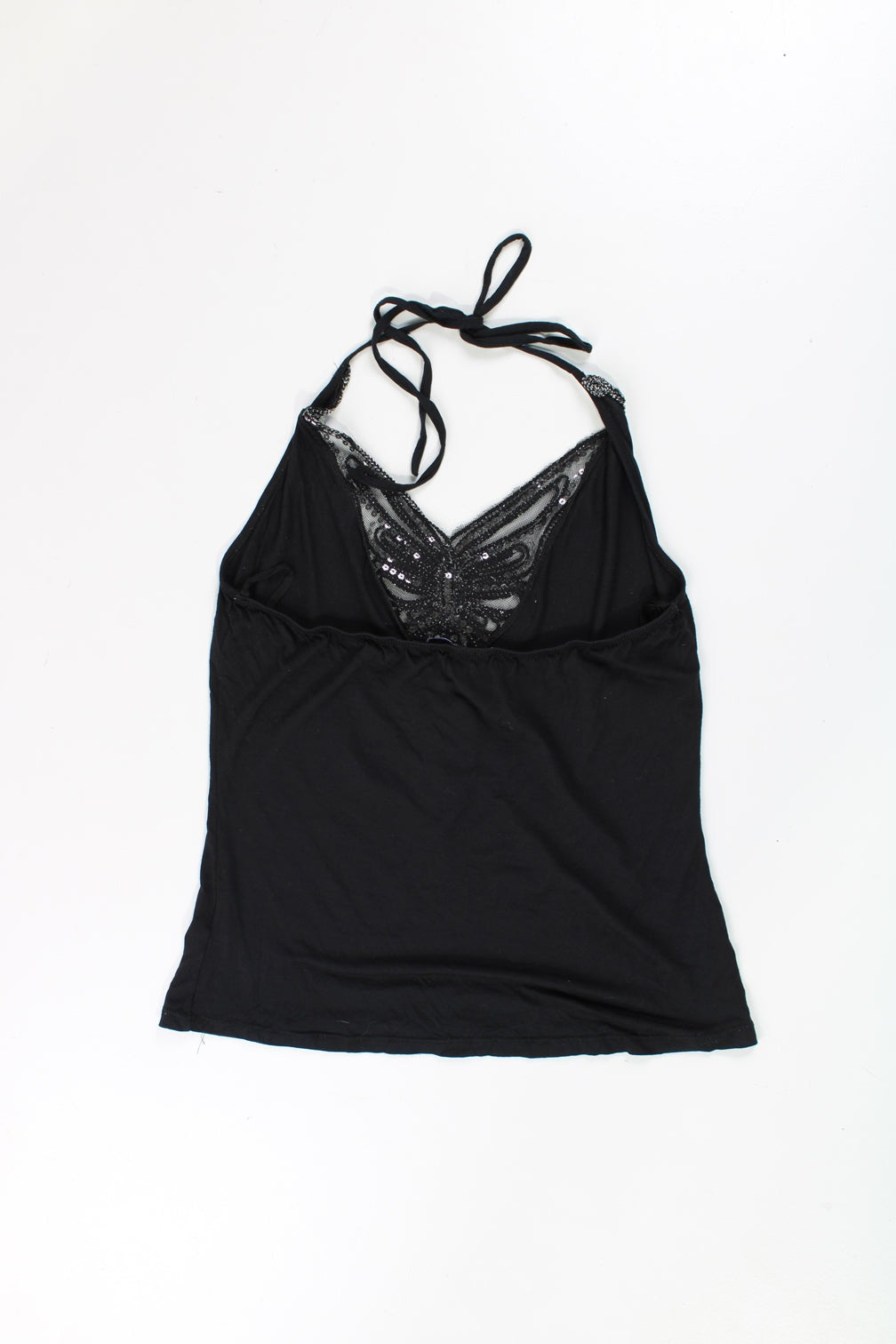 Black Y2K Morgan tie halter neck top, features metallic silver embroidered butterfly on the front