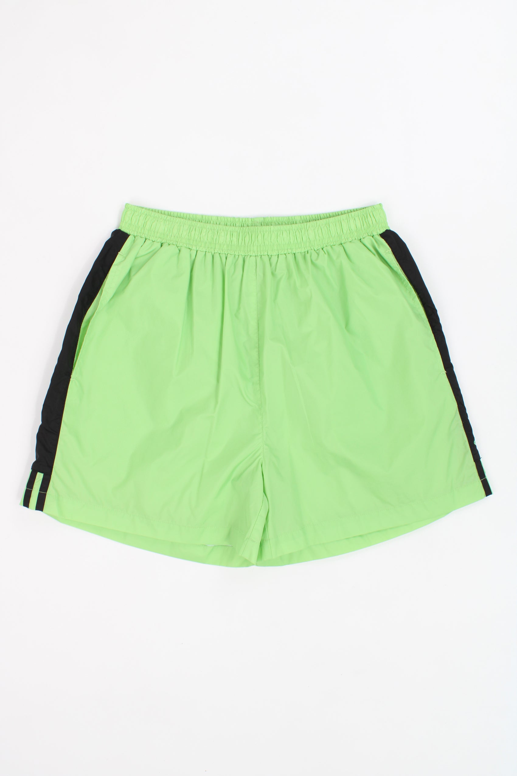 Vintage Adidas neon green nylon sport shorts with white three stripe details on the leg