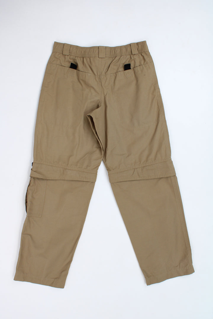 Adidas tan sport trousers with zip off legs and embroidered logo on the pocket