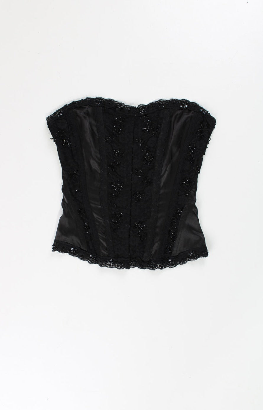 Black Y2K Jane Norman corset top. Made from a slightly stretchy black satin style fabric with lace and sequin embellishment. Closes with hook and eye fastenings down the front and also ties at the back to adjust the fit. good condition Size in Label: No Size Label - Measure like XS