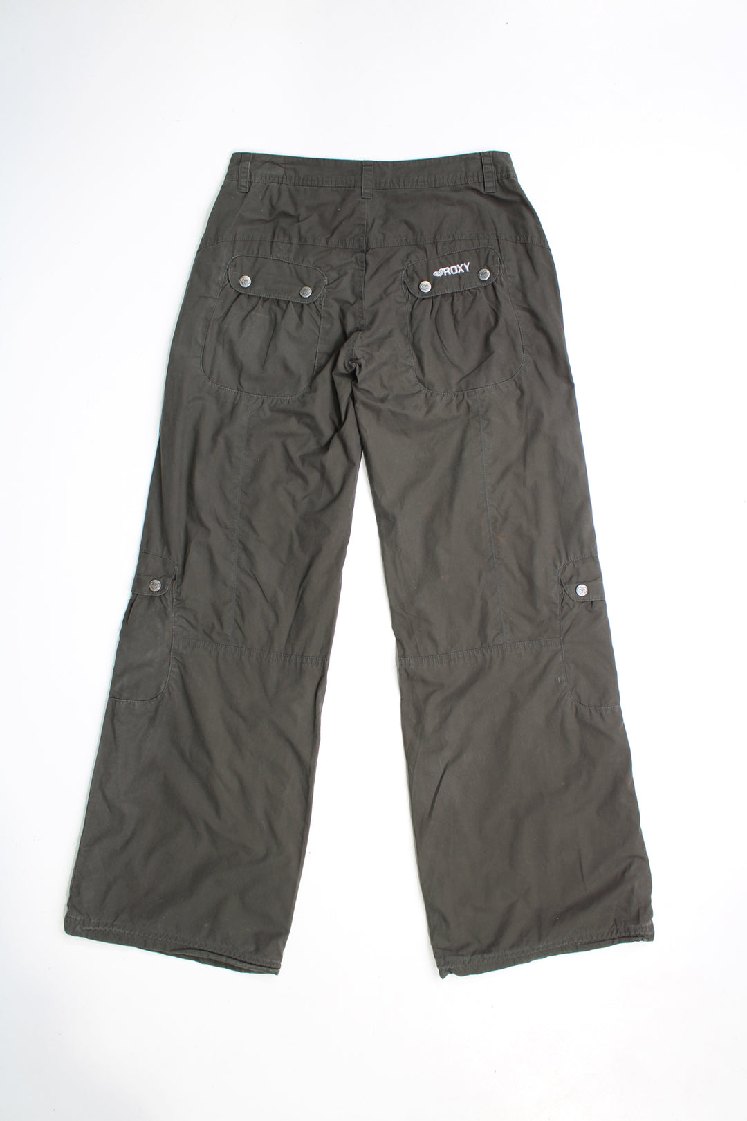 Y2K Roxy mid rise, dark khaki green (almost black), wide leg cargo trousers. Features silver embroidered Roxy logo on the back.  good condition - faint mark on the front (see photos)  Size in Label:  16 - Measures more like a Womens M  Our Measurements: