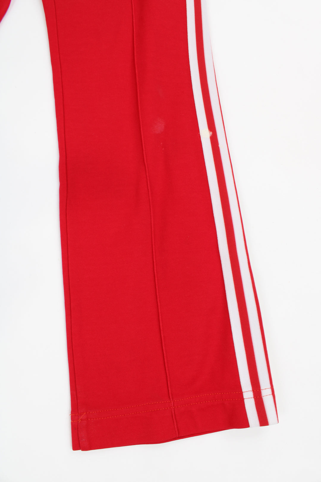 Vintage 80's Adidas german red tracksuit bottoms with elasticated waistband, signature three stripes 