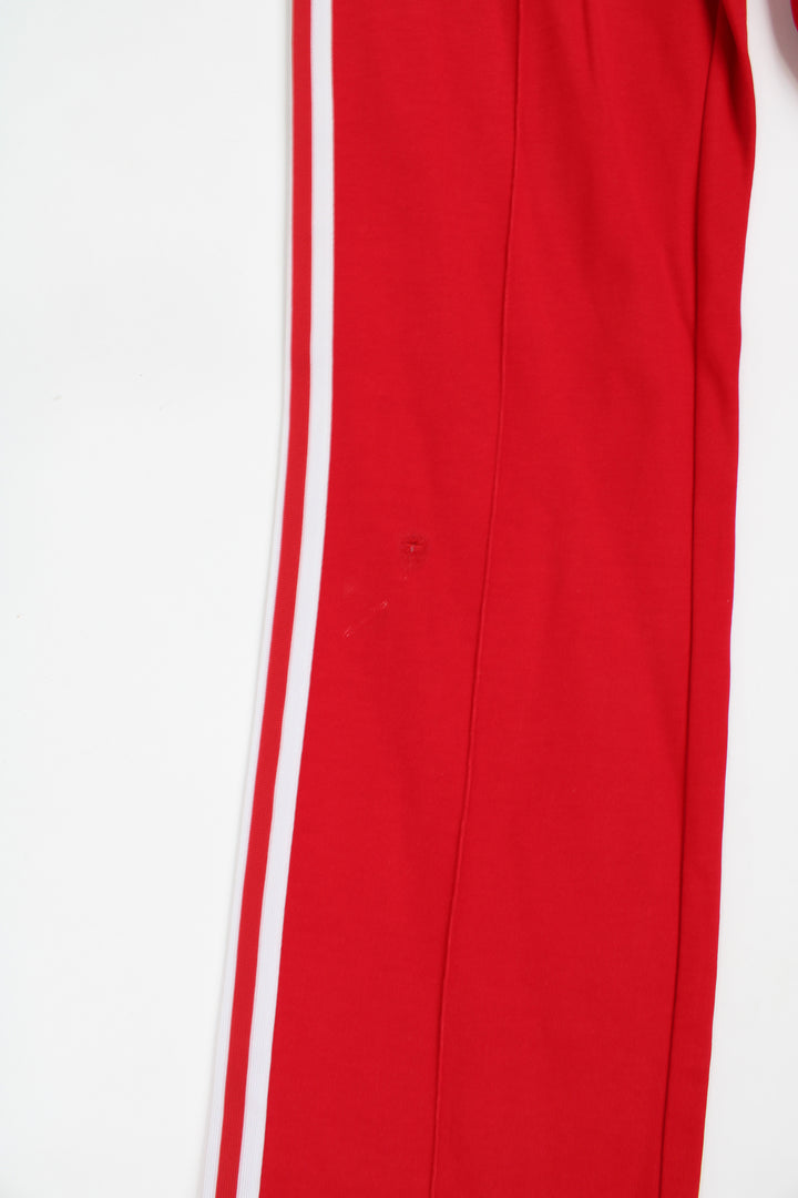 Vintage 80's Adidas german red tracksuit bottoms with elasticated waistband, signature three stripes 