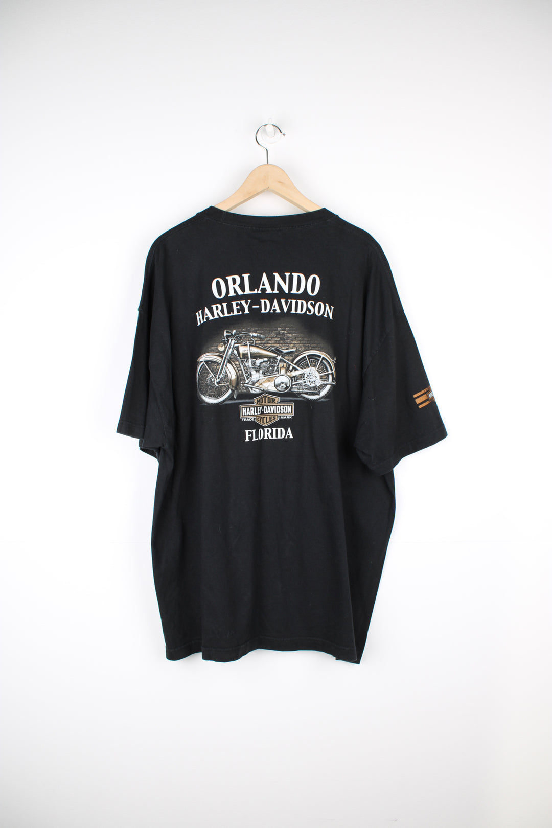 Vintage Harley Davidson Orlando Florida black t-shirt with spell-out graphic on the front and motorcycle on the back