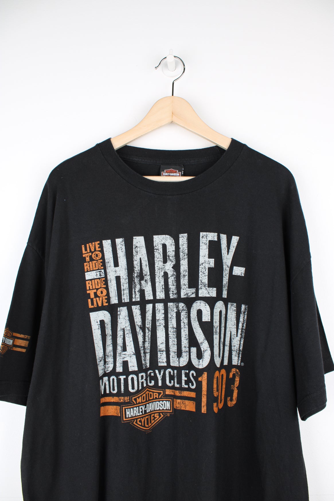 Vintage Harley Davidson Orlando Florida black t-shirt with spell-out graphic on the front and motorcycle on the back