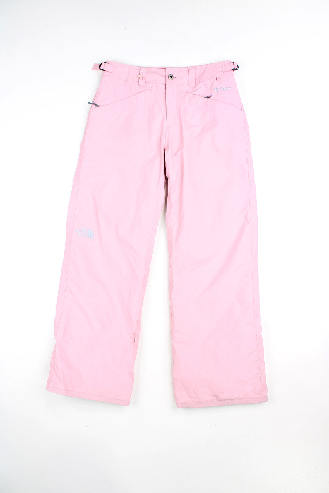 The North Face Hyvent baby pink fleece lined salopettes, features zip up pockets and embroidered logo on the leg