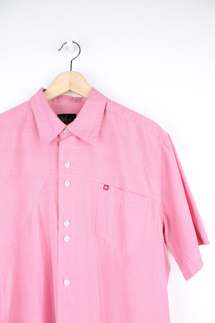 Quiksilver pink button up striped shirt with chest pocket, embroidered logo and printed design on the back of the shoulder