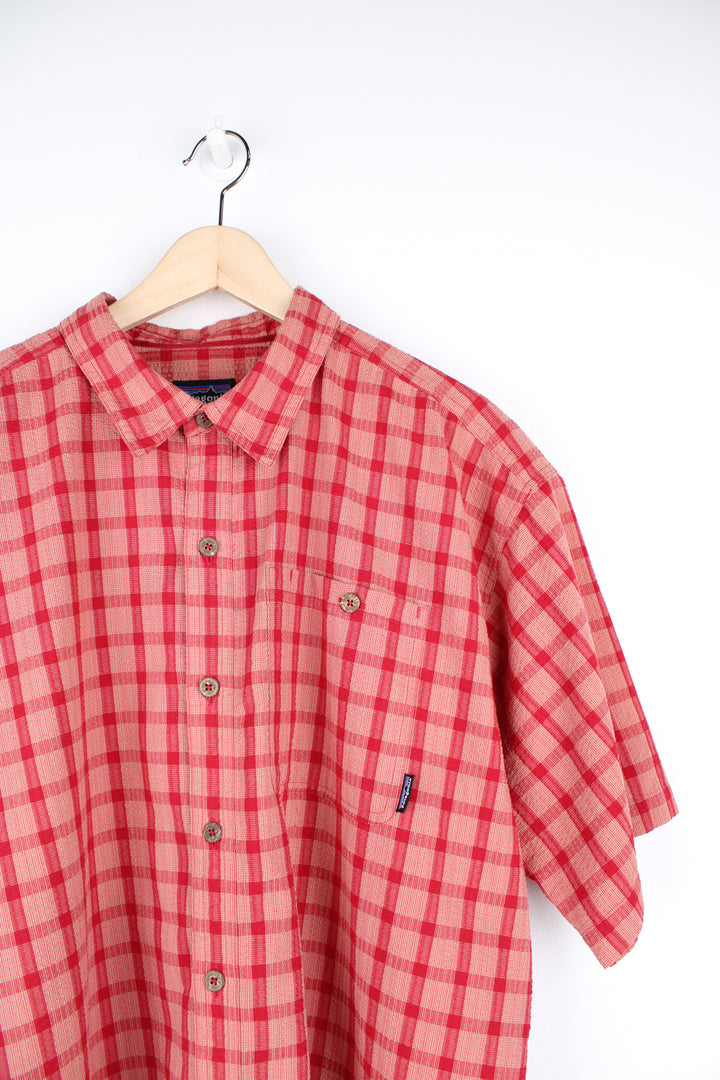 Patagonia rusted red large plaid shirt with signature Patagonia label on the pocket