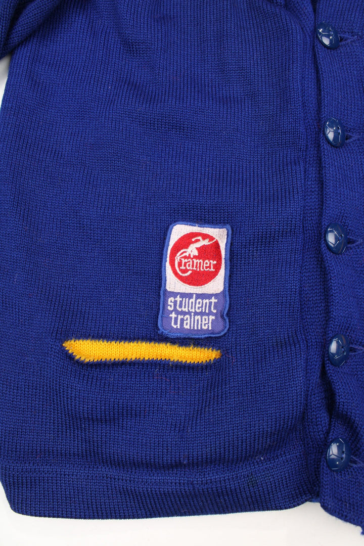 Vintage 1960's 100% wool blue and yellow varsity/letterman cardigan, features embroidered badges all over