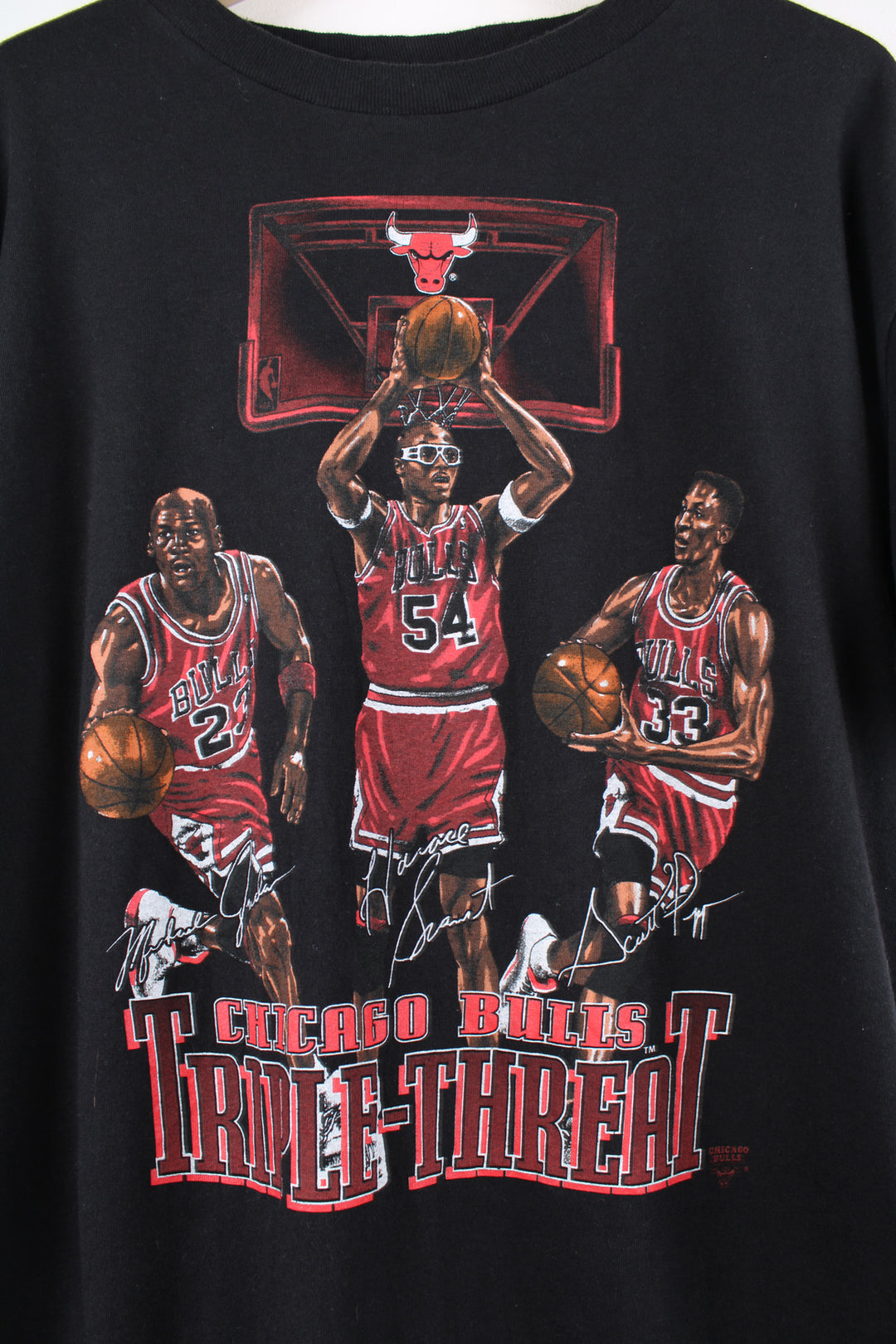 Vintage 90's 'Chicago Bulls Triple Threat' single stitch t-shirt features Michael Jordan, Scottie Pippen and Horace Grant printed graphic on the front 