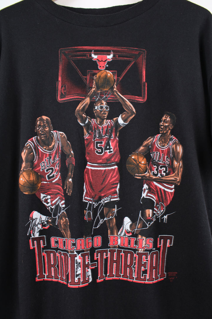 Vintage 90's 'Chicago Bulls Triple Threat' single stitch t-shirt features Michael Jordan, Scottie Pippen and Horace Grant printed graphic on the front 