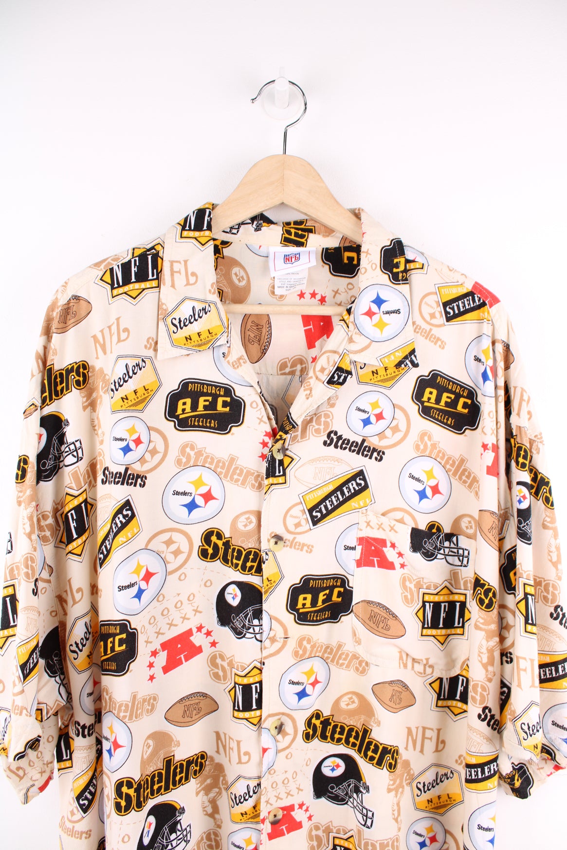 Pittsburg Steelers Hawaiian shirt in tan, features all over print and chest pocket 