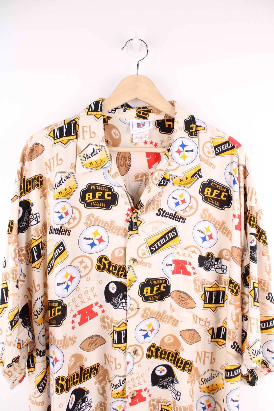 Pittsburg Steelers Hawaiian shirt in tan, features all over print and chest pocket 