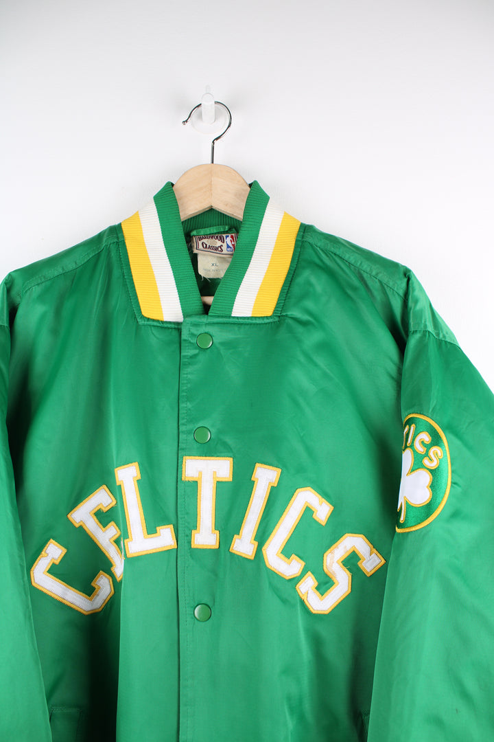 Vintage 80's Boston Celtics satin varsity jacket by Hardwood Classics.