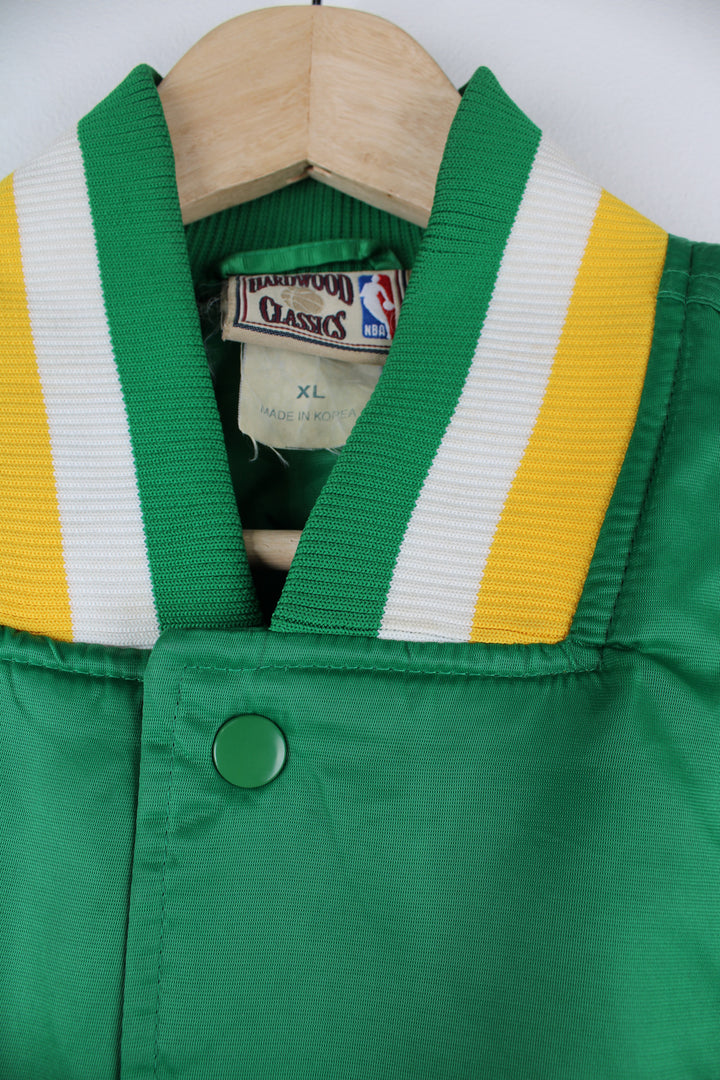 Vintage 80's Boston Celtics satin varsity jacket by Hardwood Classics.